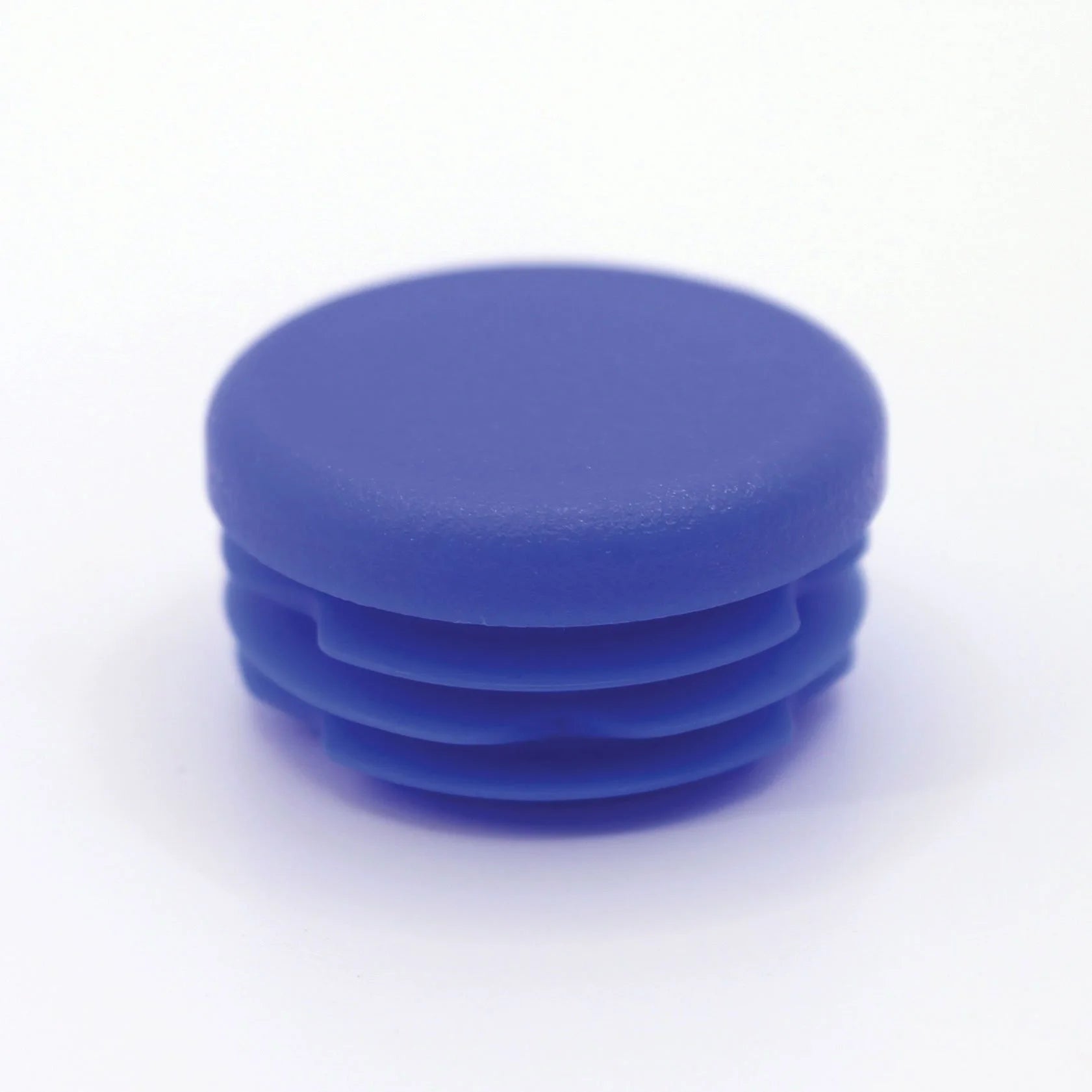 ROUND PUSH IN PLASTIC INSERT - 1.25" DIA